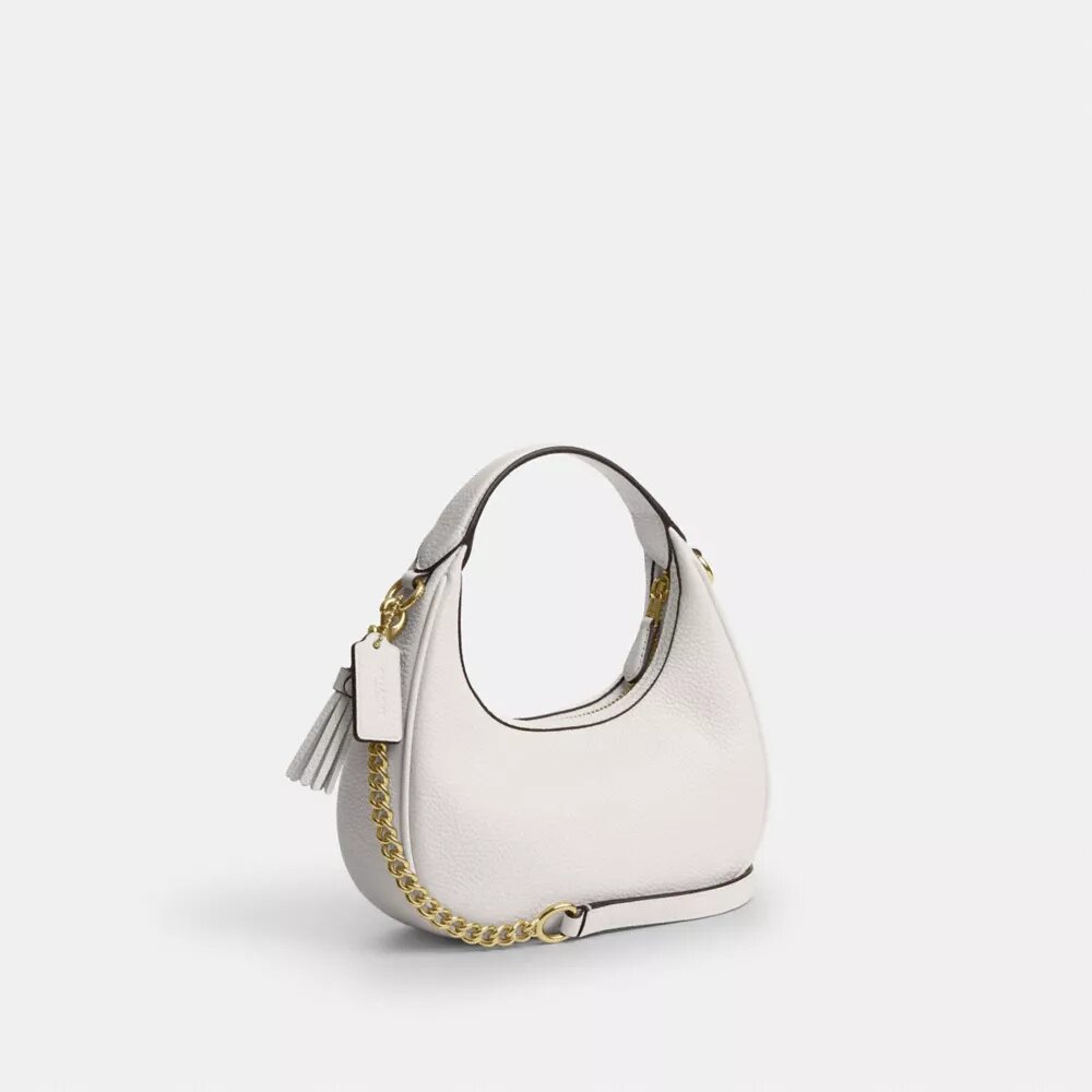 Genți crossbody Carmen mini cu curea transversală și nituri în formă de inimă