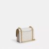 Genți crossbody mini Klare cu curea transversală din Signature Canvas