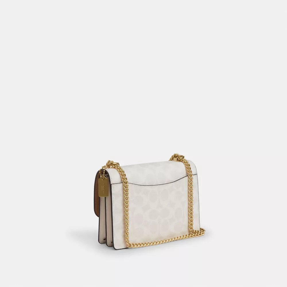 Genți crossbody mini Klare cu curea transversală din Signature Canvas