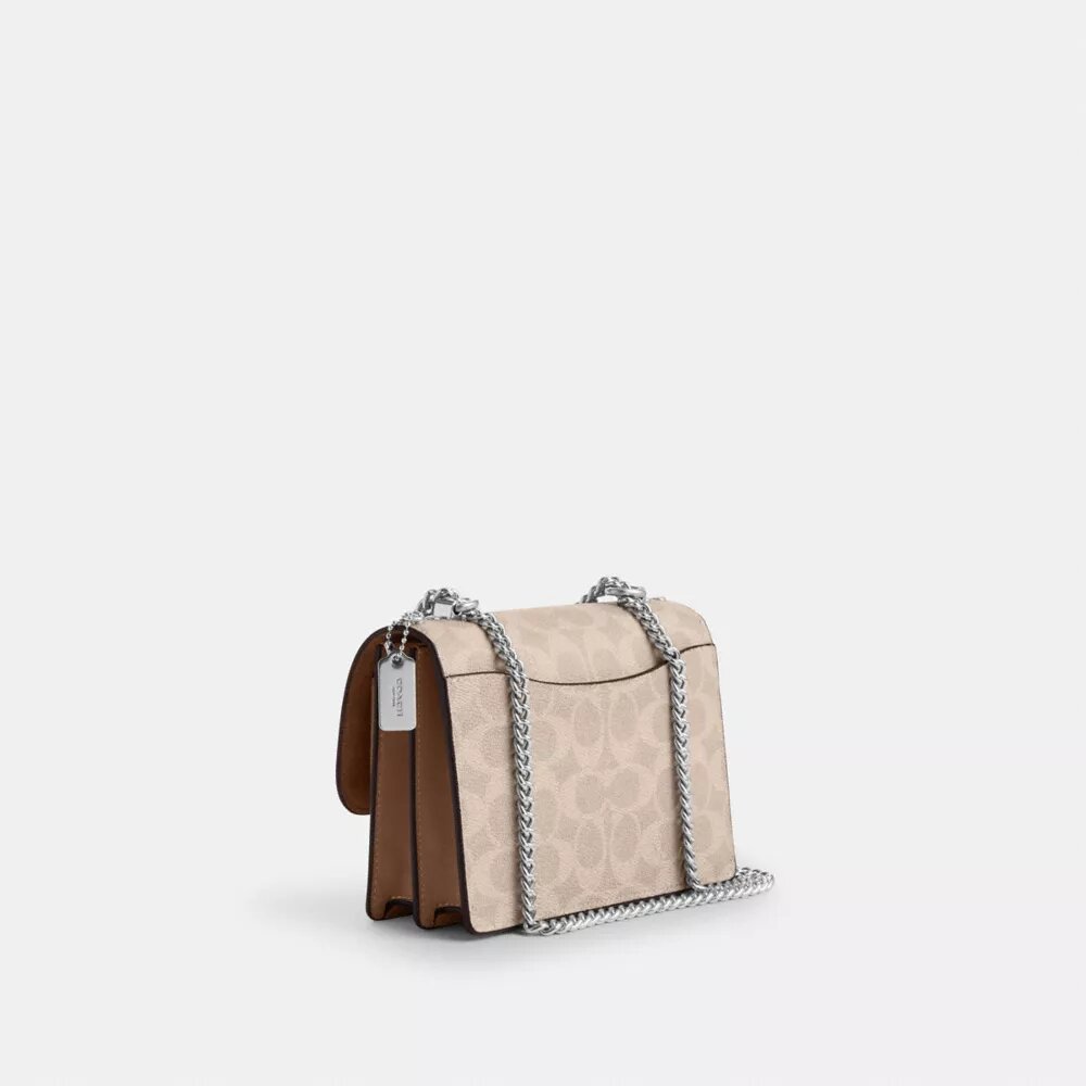 Genți crossbody mini Klare cu curea transversală din Signature Canvas