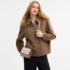 Genți crossbody mini Klare cu curea transversală din Signature Canvas