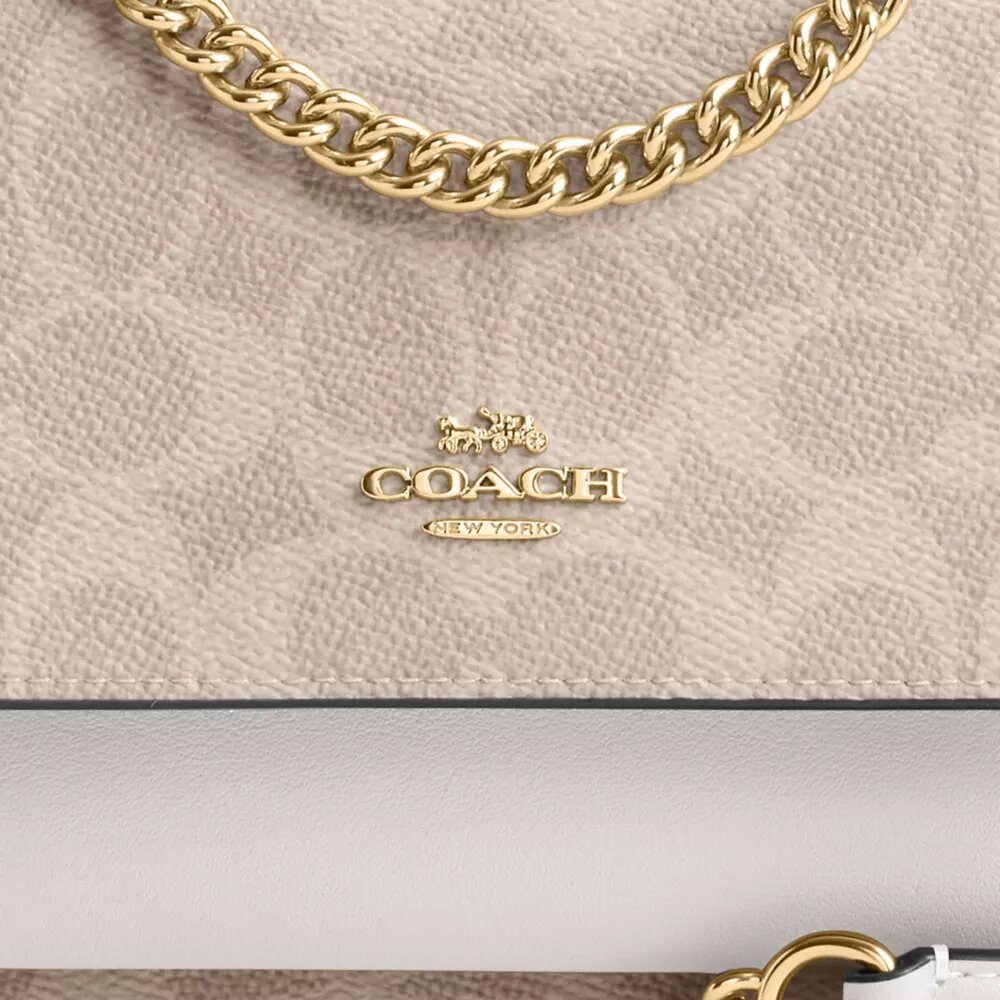 Genți crossbody mini Klare cu curea transversală din Signature Canvas