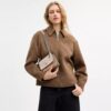 Genți crossbody mini Klare cu curea transversală din Signature Canvas