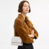 Genți crossbody mini Klare cu curea transversală din Signature Canvas