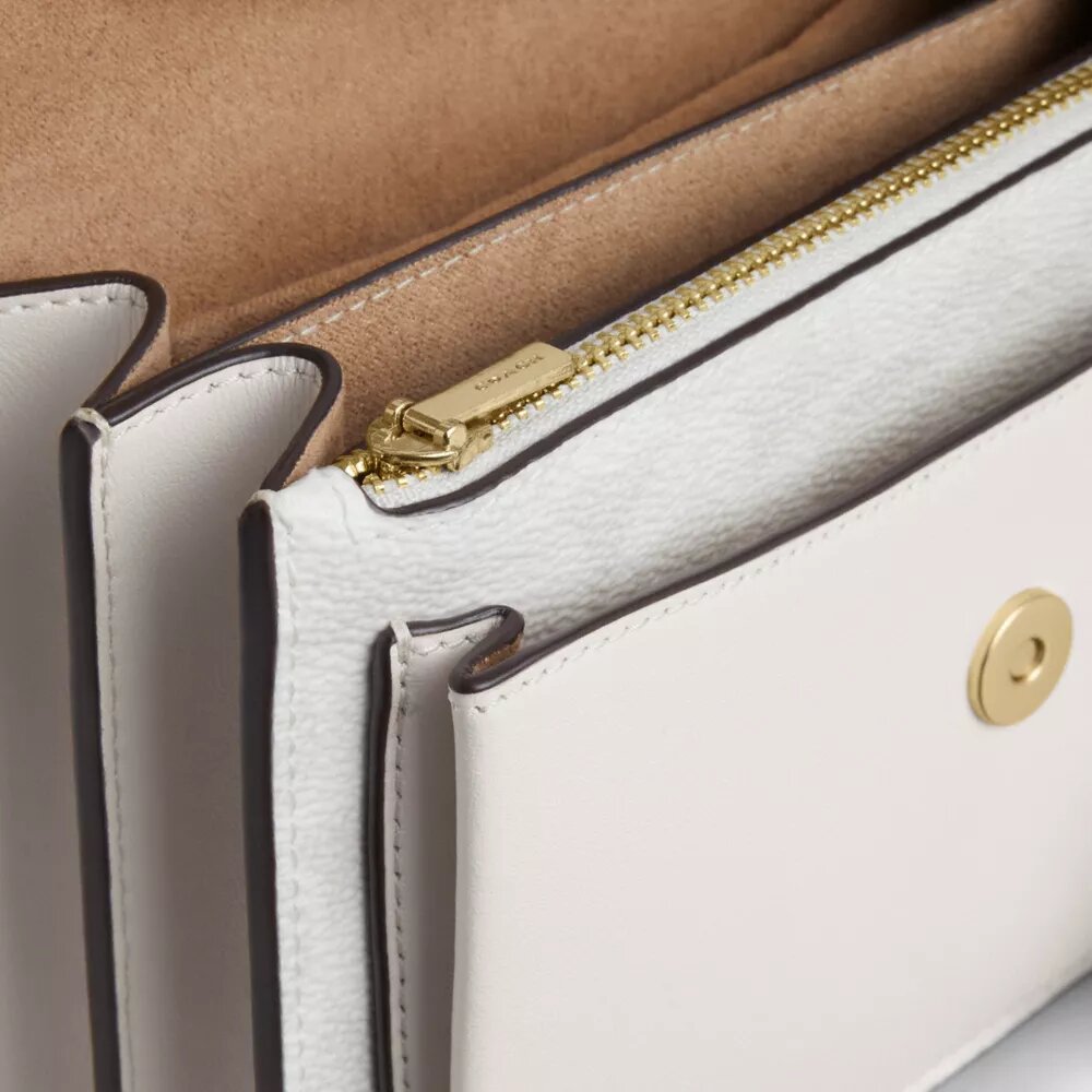 Genți crossbody mini Klare cu curea transversală din Signature Canvas