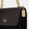 Genți crossbody mini Klare cu curea transversală din Signature Canvas