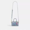 Genți crossbody mini Rowan din denim uzat, cu pandantive