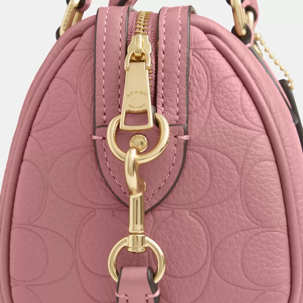 Genți crossbody mini Rowan din piele semnătură