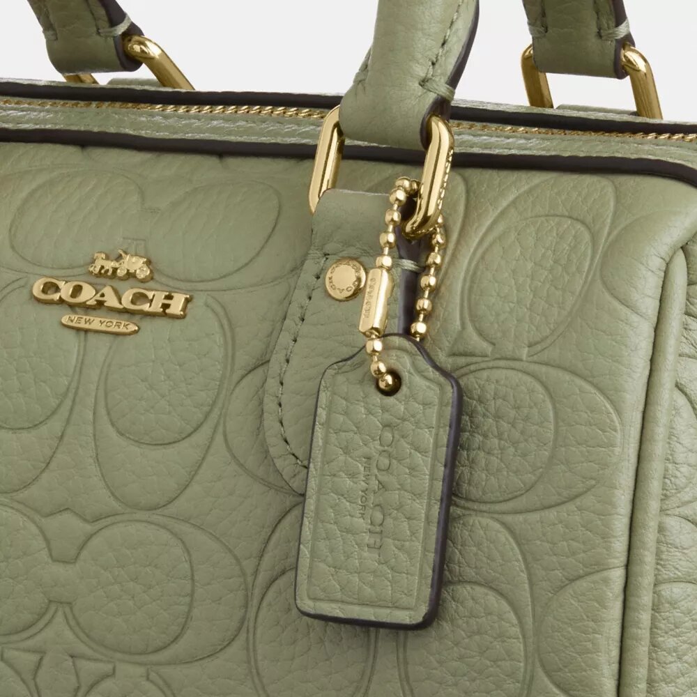 Genți crossbody mini Rowan din piele semnătură