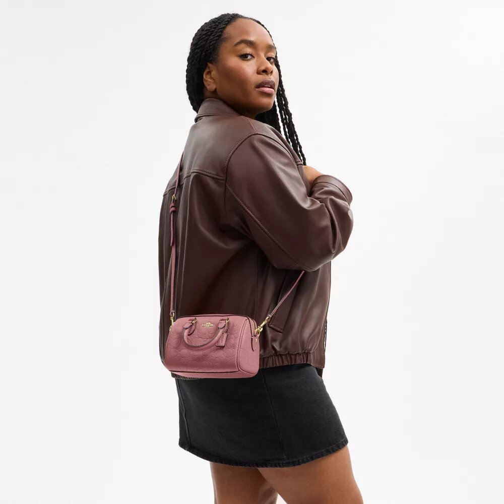 Genți crossbody mini Rowan din piele semnătură