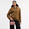 Genți crossbody mini Rowan din piele semnătură