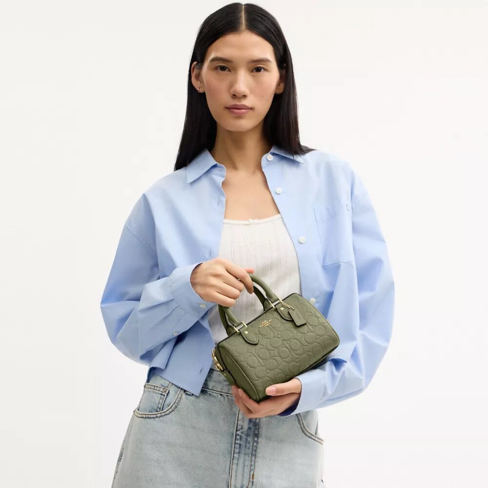 Genți crossbody mini Rowan din piele semnătură