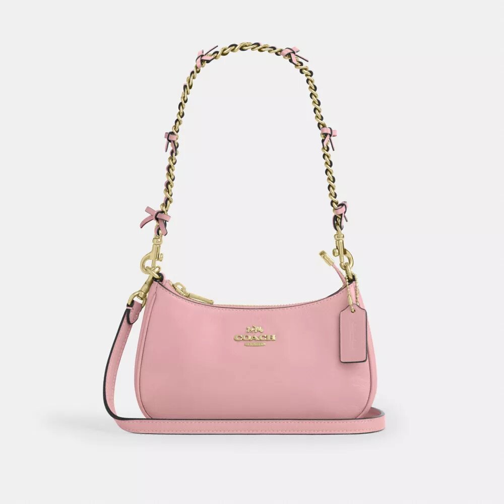 Genți crossbody Teri cu fundițe, purtată pe umăr