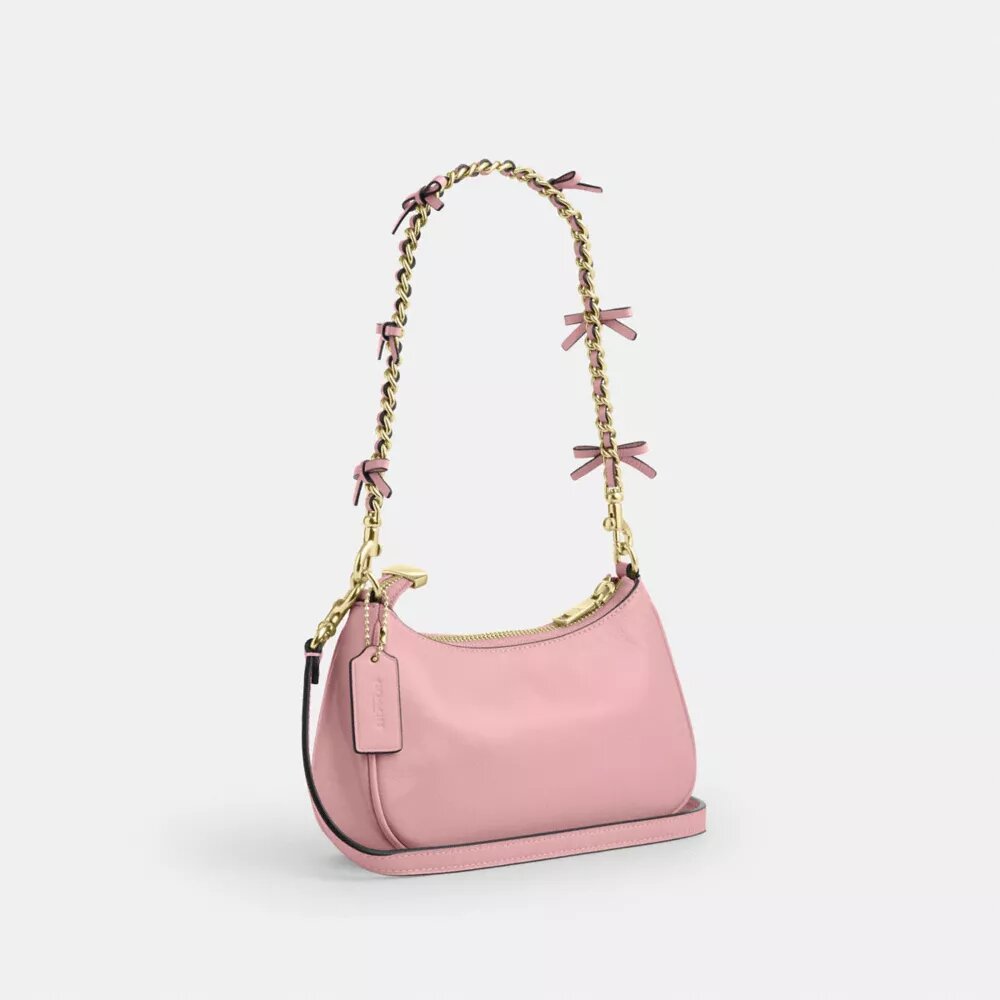 Genți crossbody Teri cu fundițe, purtată pe umăr