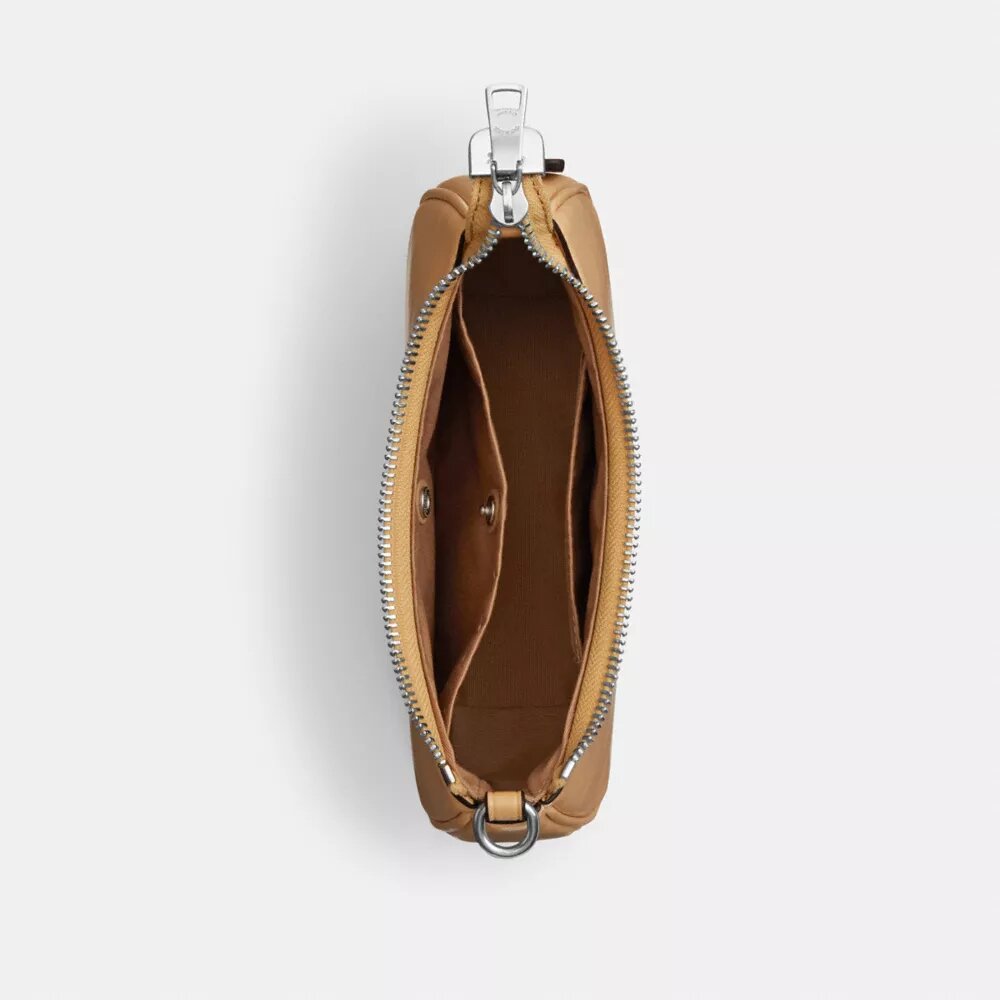Genți crossbody Teri cu fundițe, purtată pe umăr