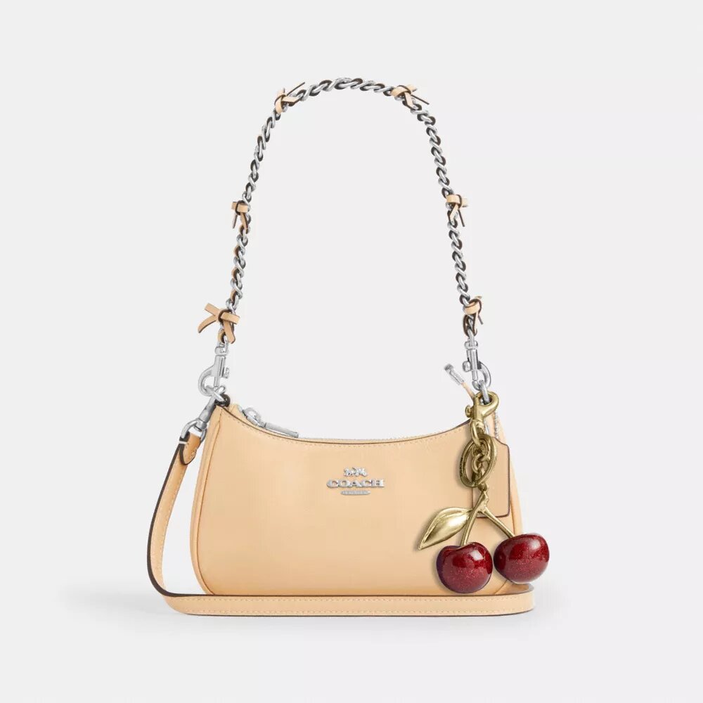 Genți crossbody Teri cu fundițe, purtată pe umăr