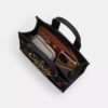 Genți Tote Disney X Coach Cargo 26 cu Mickey Mouse, din pânză de bumbac regenerativ