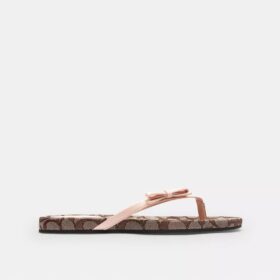 Șlapi cu fundă în modelul Jacquard Signature