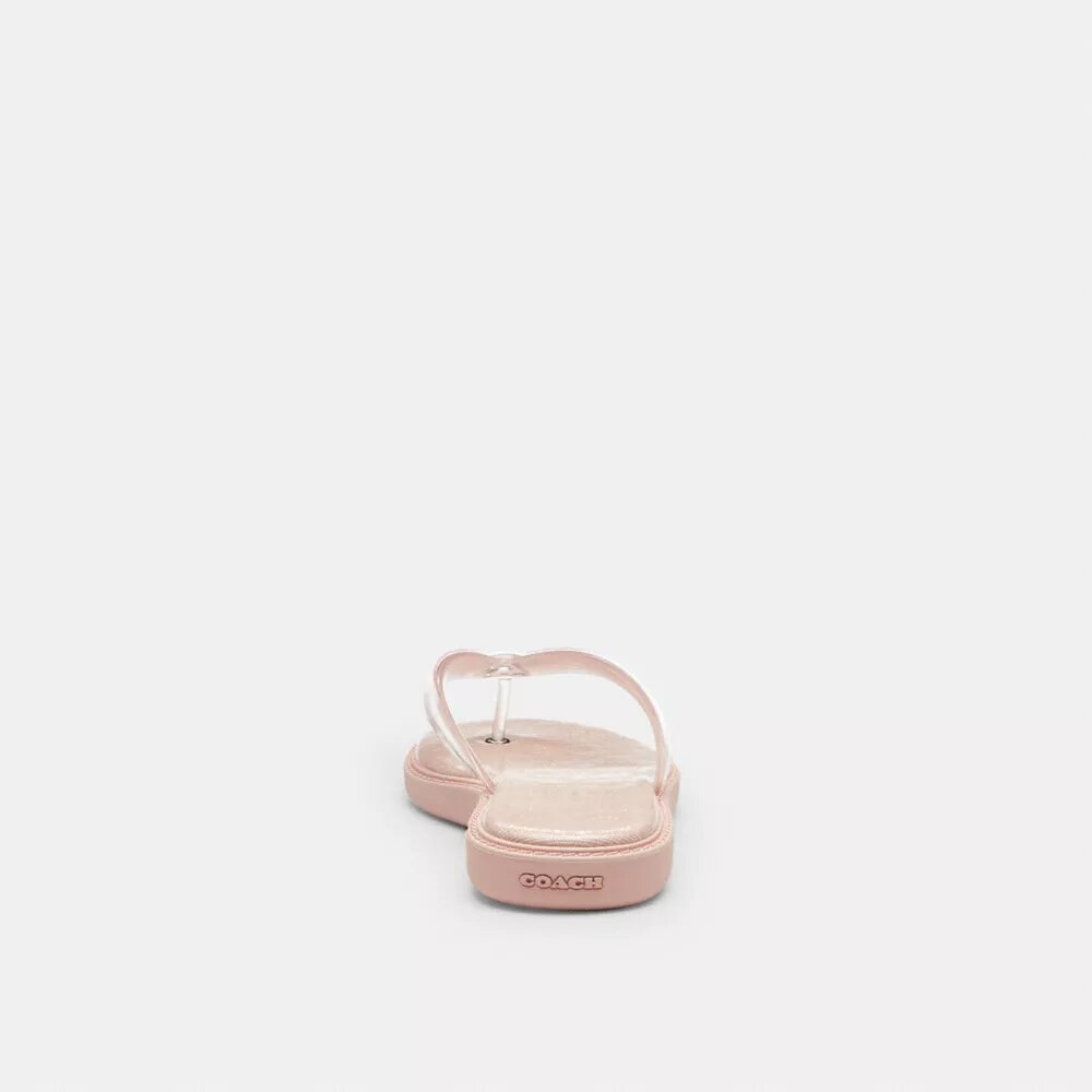 Șlapi din material jelly cu design caracteristic