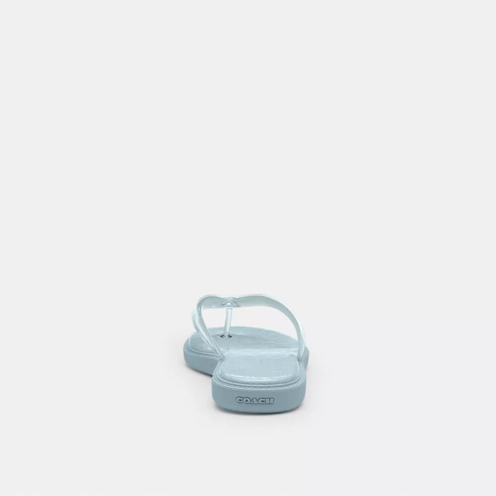 Șlapi din material jelly cu design caracteristic
