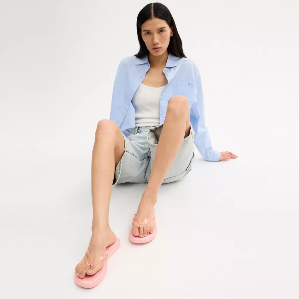 Șlapi din material jelly cu design caracteristic