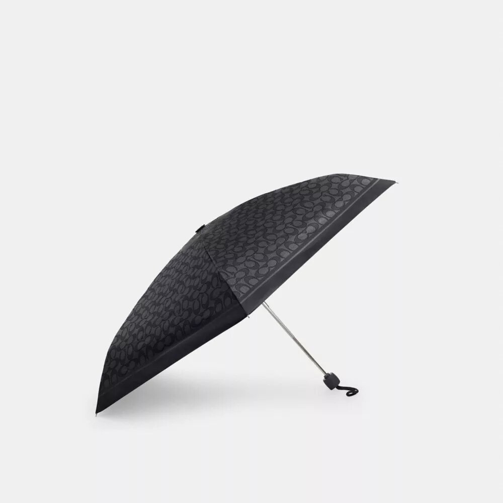 Mini-umbrelă cu protecție UV cu imprimeu caracteristic