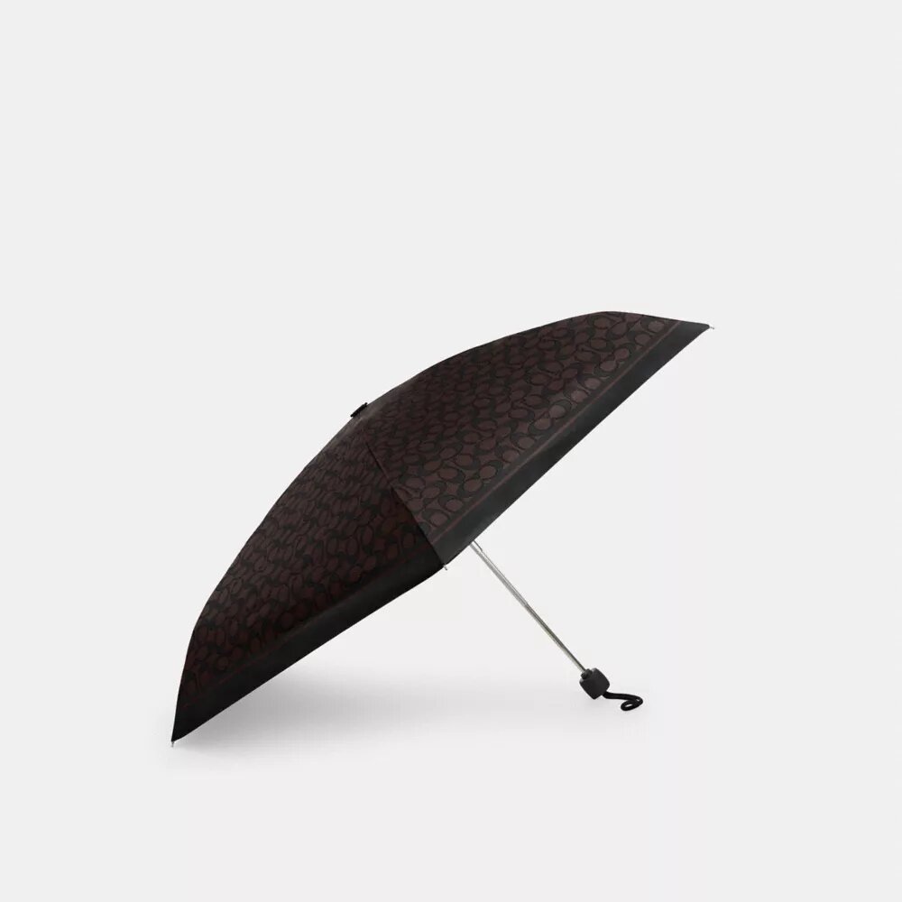 Mini-umbrelă cu protecție UV cu imprimeu caracteristic
