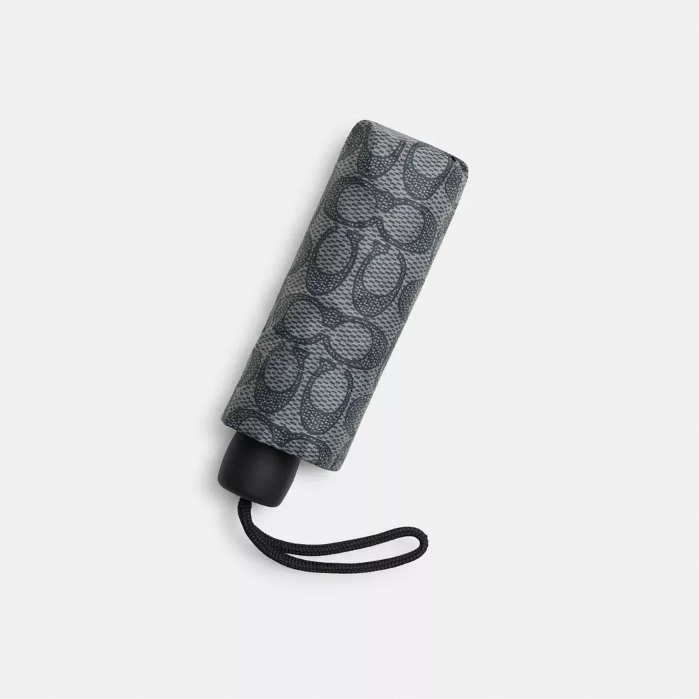 Mini-umbrelă cu protecție UV cu imprimeu caracteristic