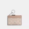 Port-act de identitate mini skinny din Signature Canvas