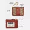 Portcard Essential Mini din Signature Canvas