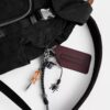 Rucsac Logan din nailon caracteristic cu pandantive decorative