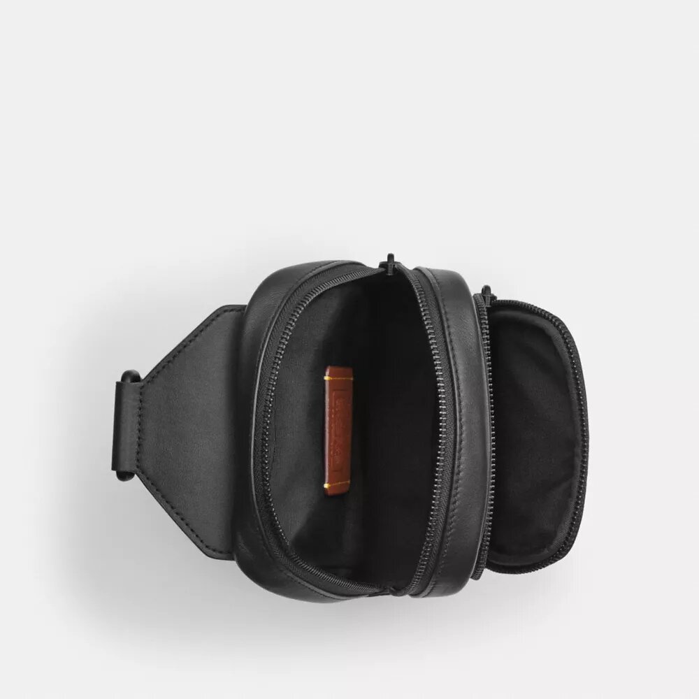 Rucsac Racer Sling din Signature Canvas