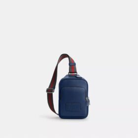 Rucsac tip sling Racer cu curele cu dungi în stil universitar