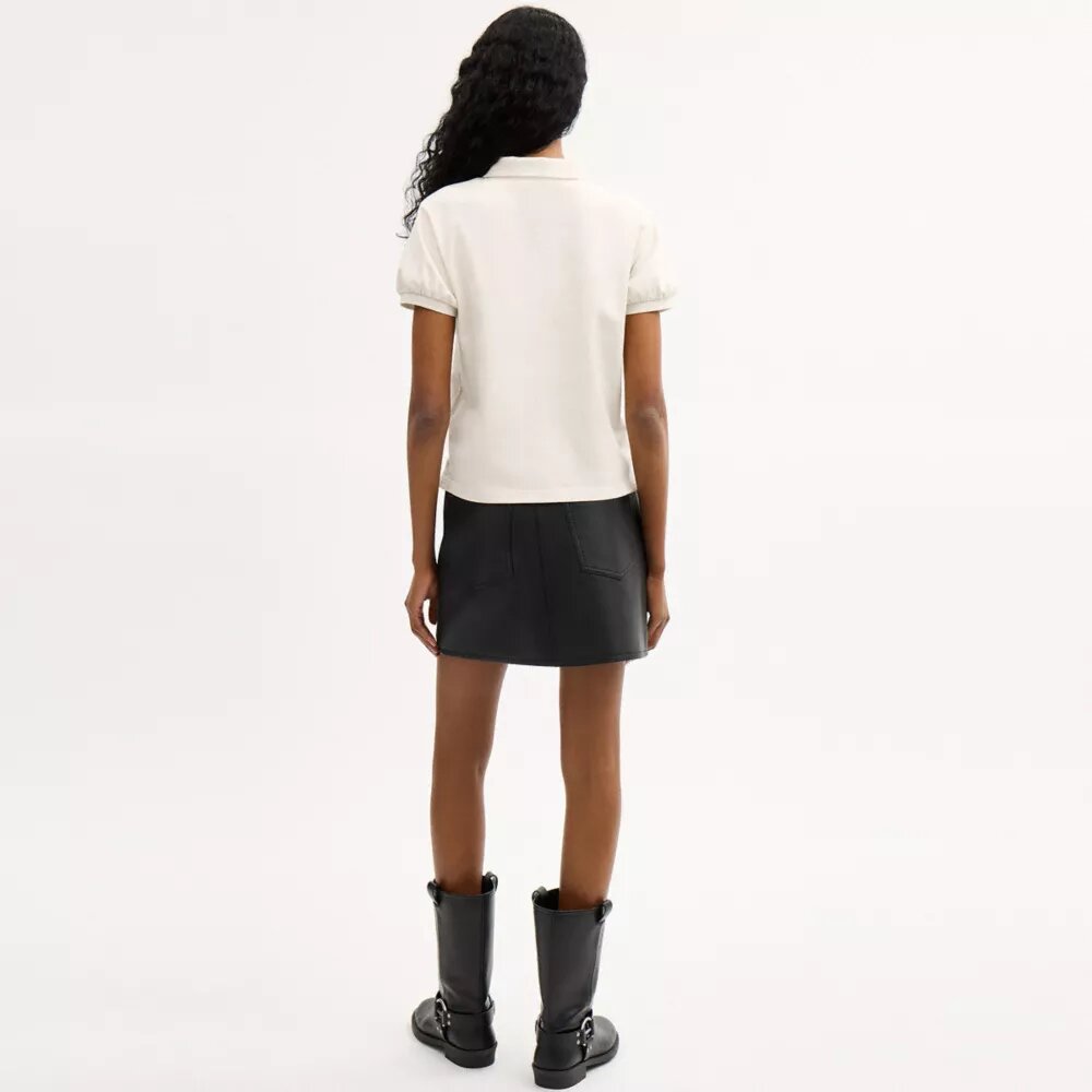 Tricouri Polo Coach Script din bumbac organic